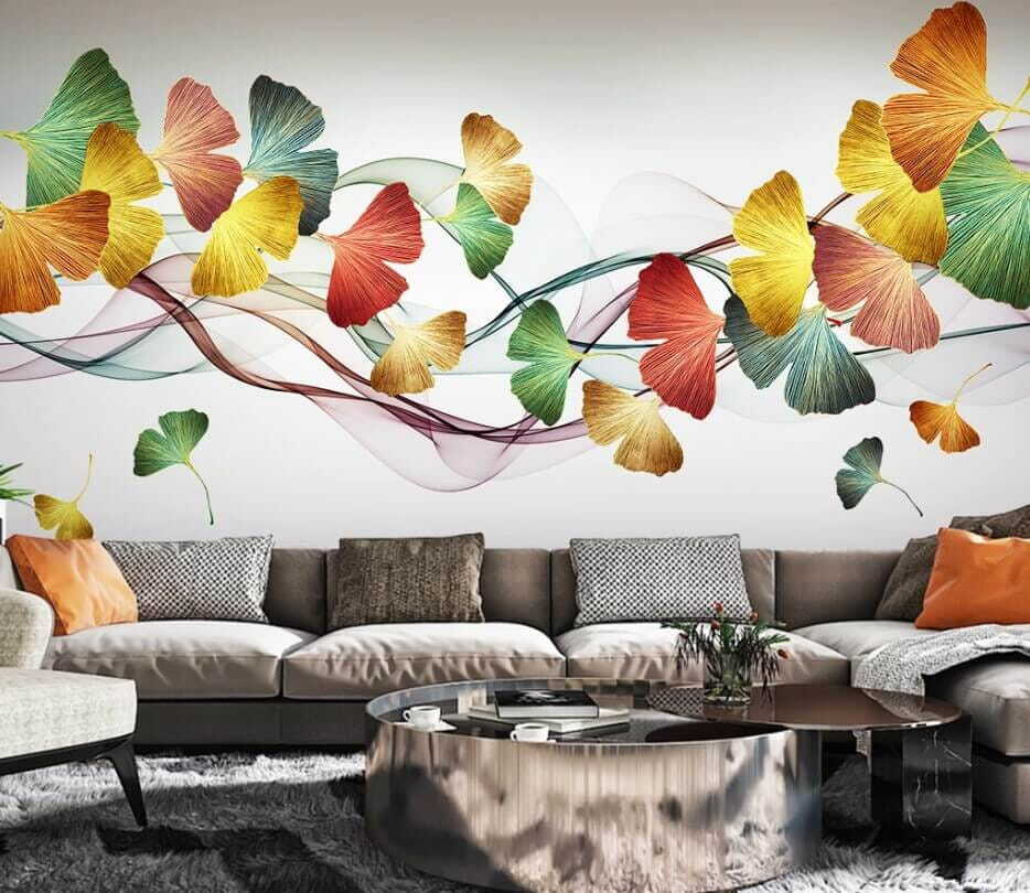 Foglie lungo nastri colorati in un ambiente