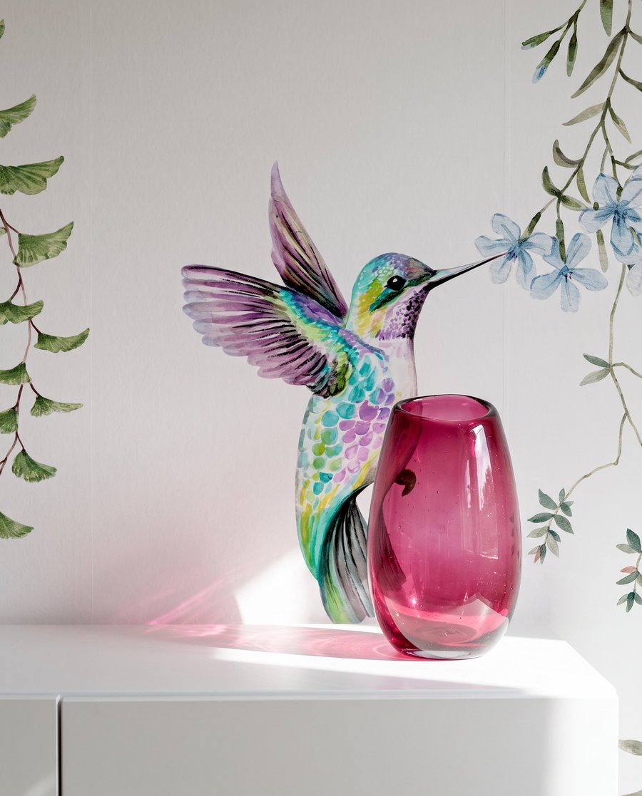 Colibrì tra fiori appesi — dettaglio