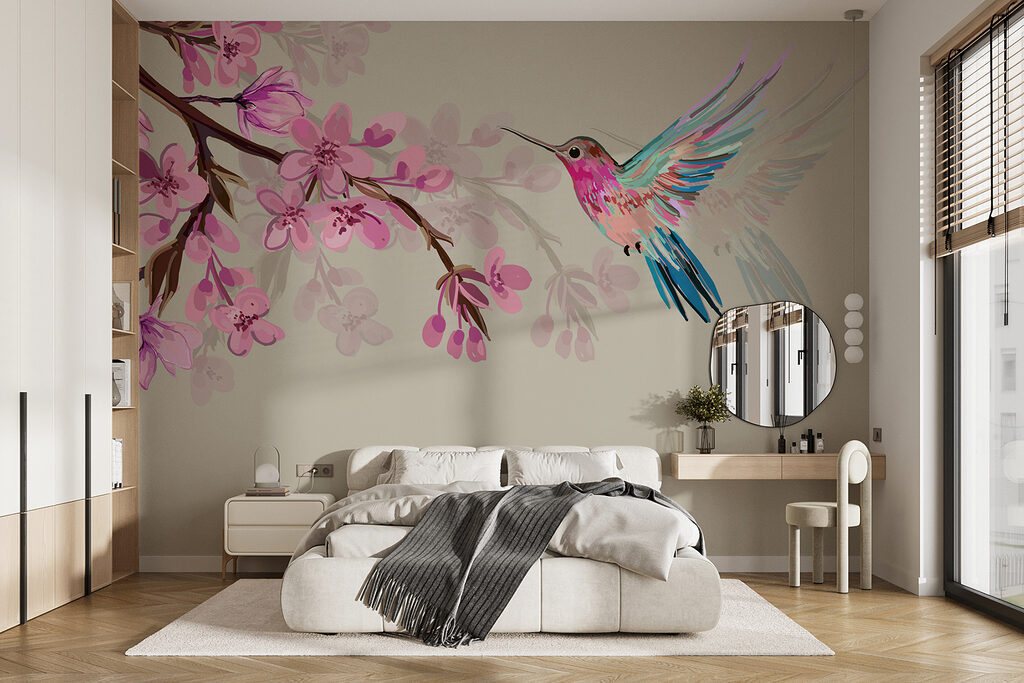 Colibrì e fiori rosa in un ambiente
